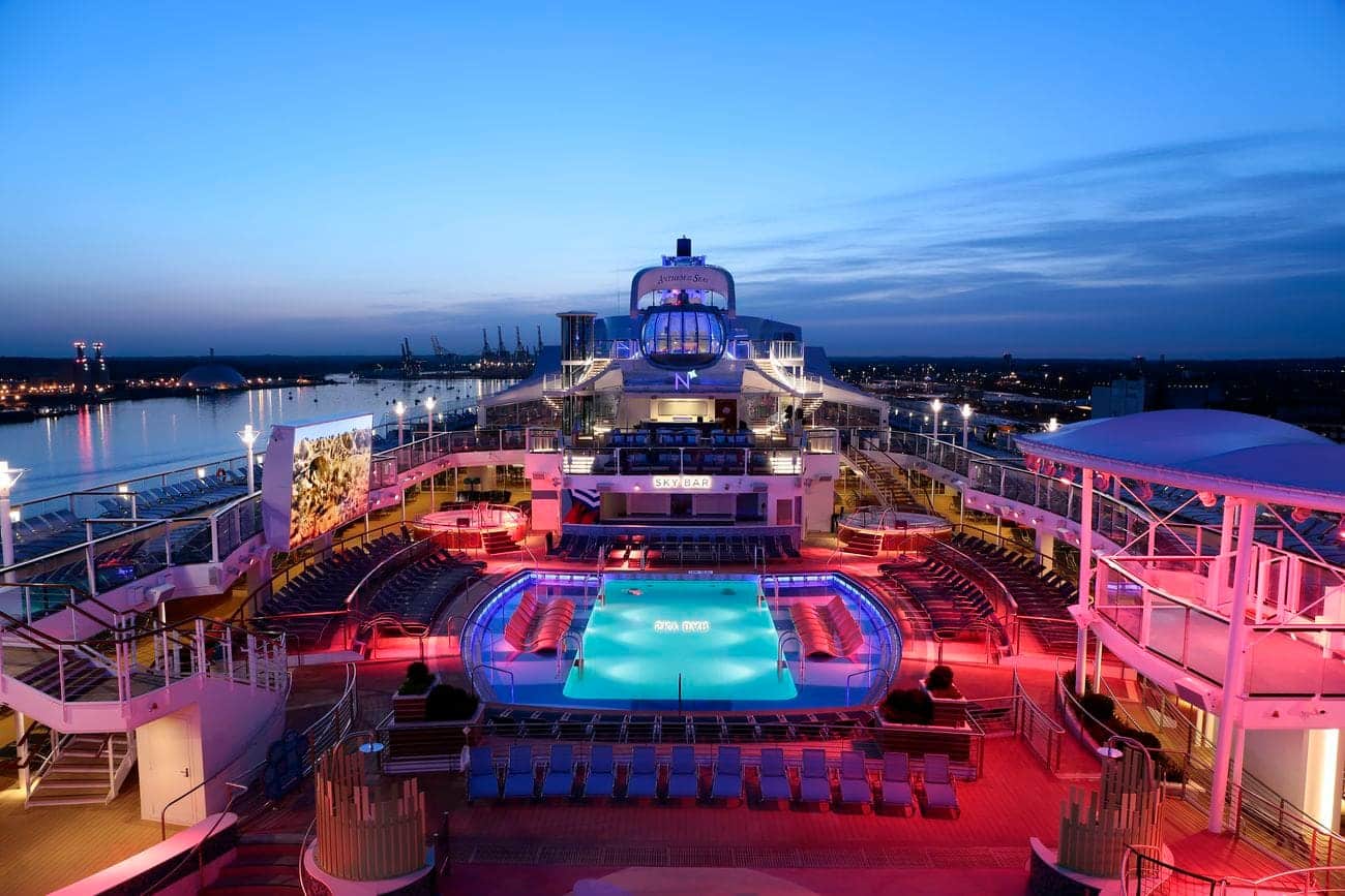 Anthem of the Seas pool deck with loungers, pools, and sea views