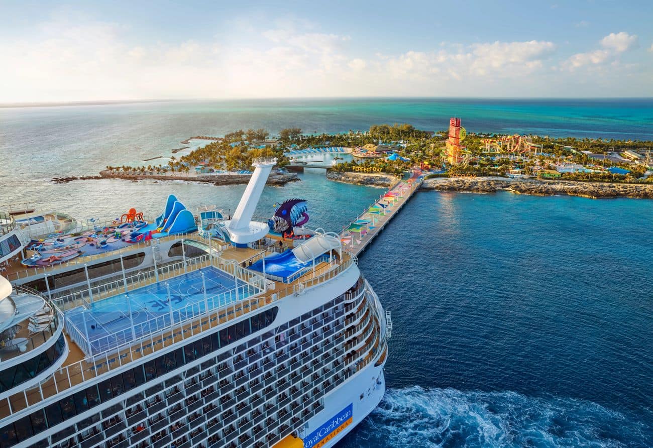Wonder of the Seas docked at Perfect Day at CocoCay with colorful pier and water attractions visible
