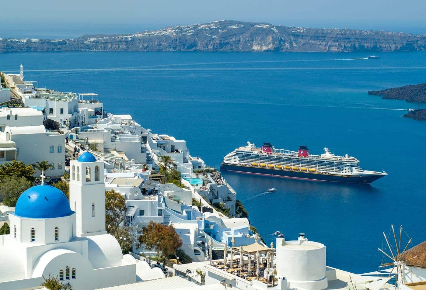 Disney Cruise Line ship near Santorini caldera