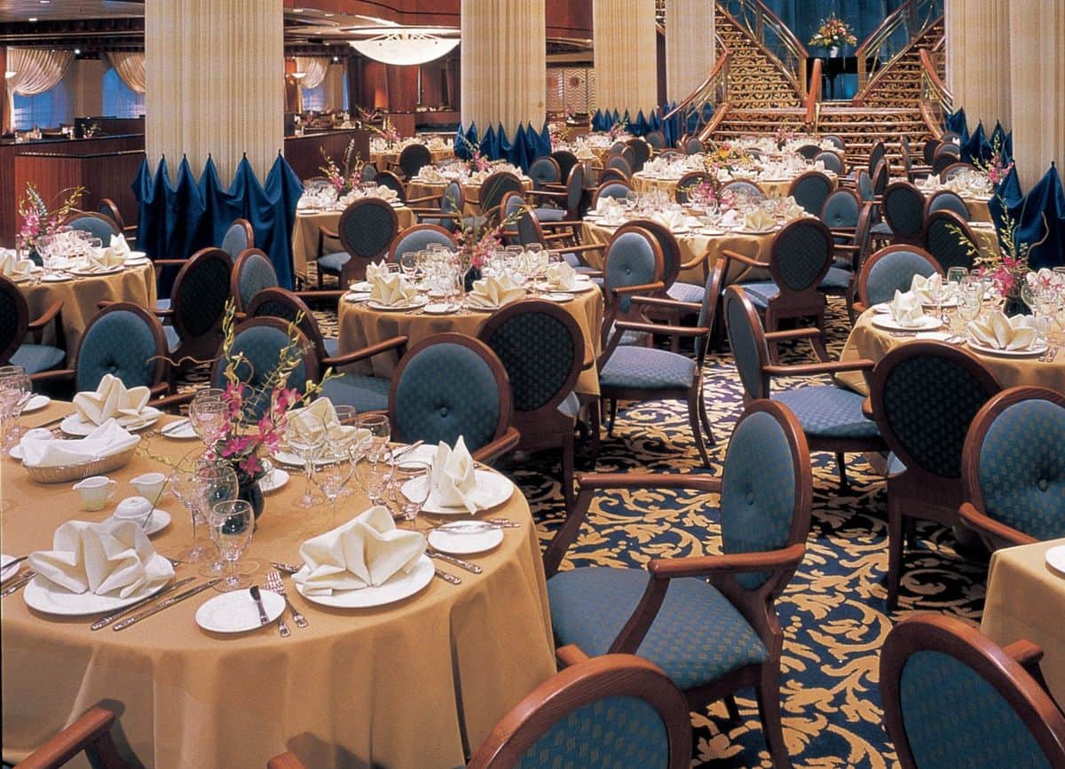 Cascades main dining room on Royal Caribbean’s Radiance of the Seas set for dinner service