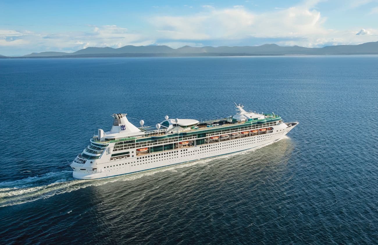 Aerial view of Royal Caribbean’s Rhapsody of the Seas cruising through Alaskan waters