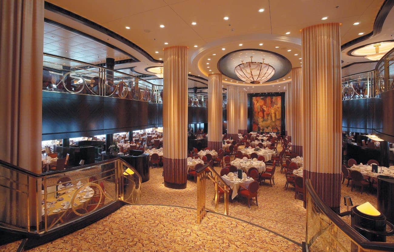 Reflections main dining room on Royal Caribbean’s Serenade of the Seas with two decks and elegant décor