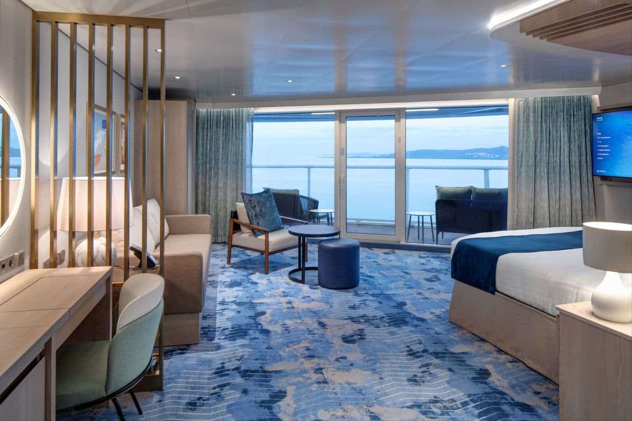Sunset Corner Suite on Royal Caribbean’s Star of the Seas with ocean-view balcony and modern décor