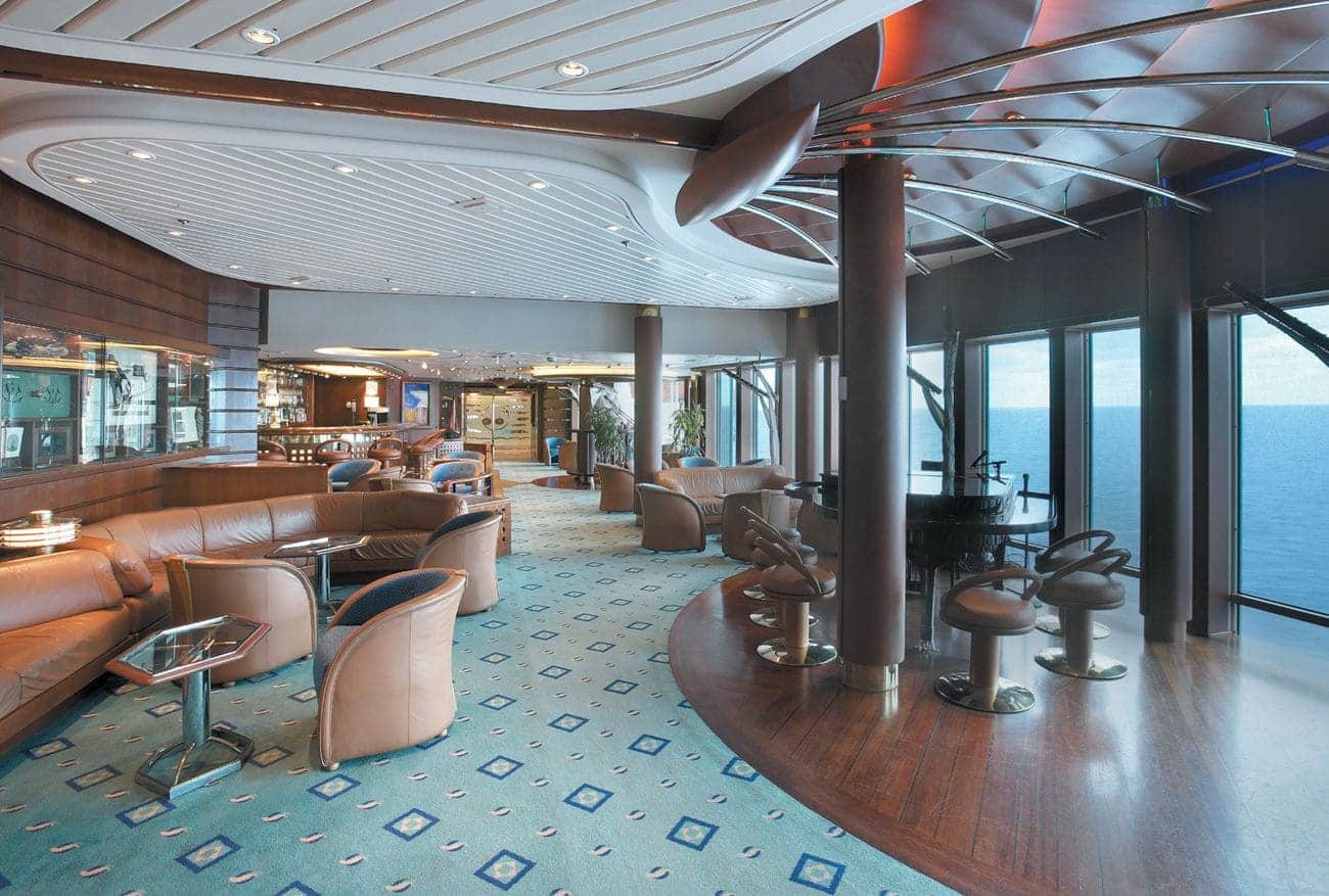 Schooner Bar with piano and ocean view seating