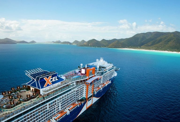 Celebrity Cruises 2027-2028 Itineraries Announced: A World of Discovery Awaits Celebrity Xcel cruising the Caribbean with mountains and sandy beaches in the distance