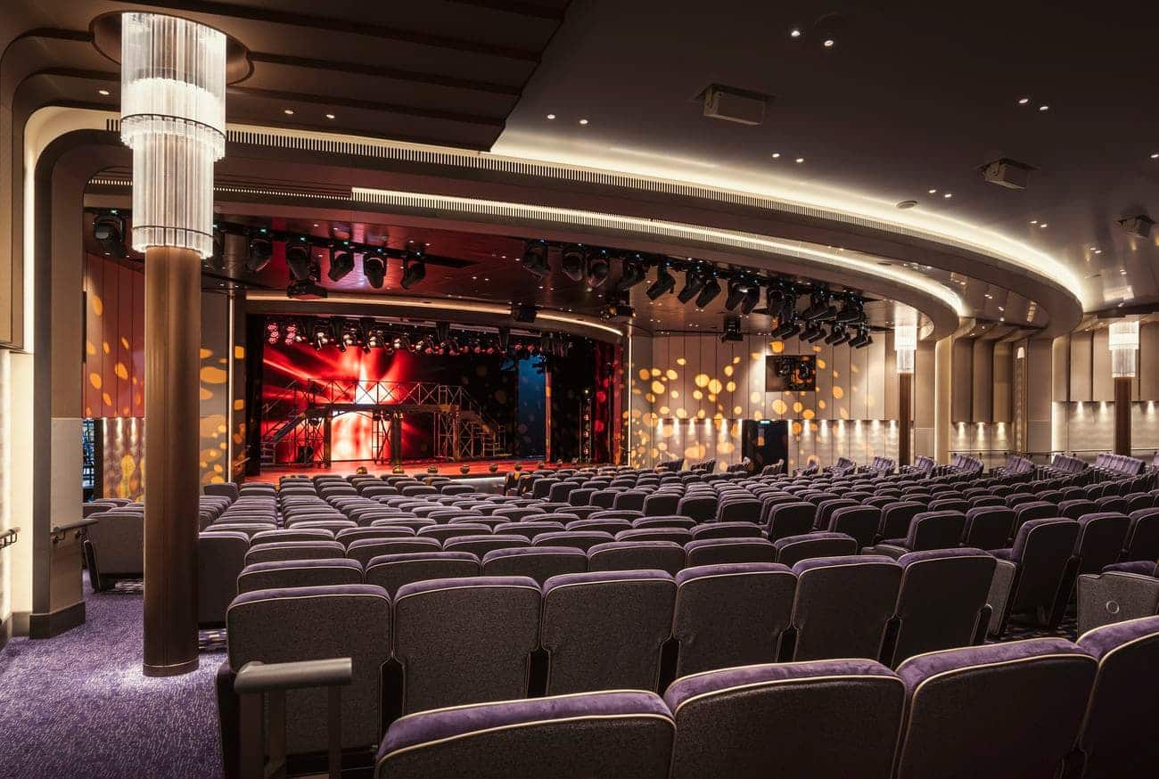 Royal Court Theatre with stage lighting and plush seating