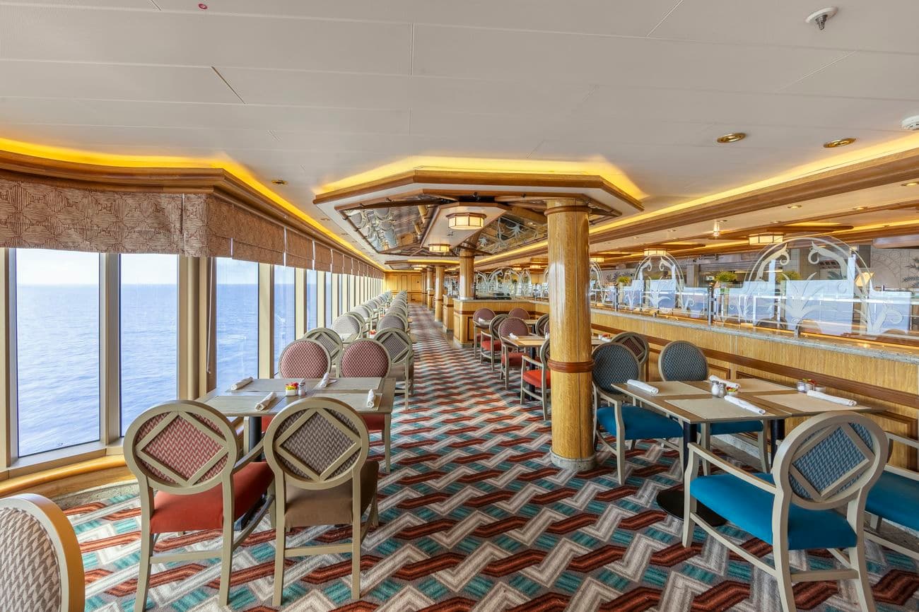 Lido Restaurant aboard Queen Elizabeth with ocean-view seating