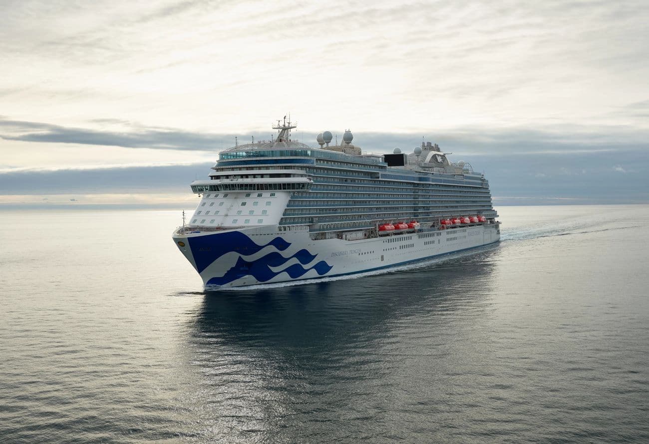 Aerial view of Discovery Princess sailing on calm open water