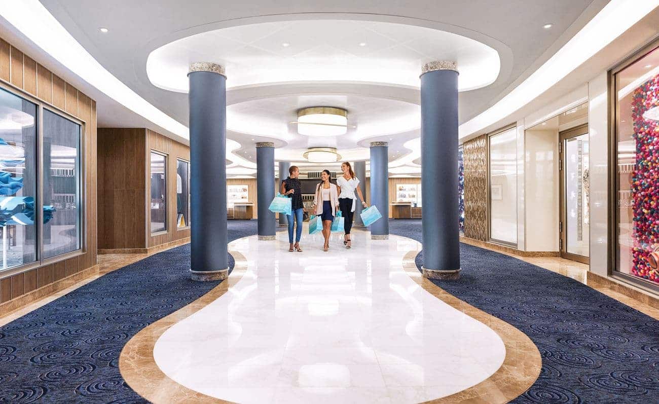 Passengers browsing luxury boutiques on Enchanted Princess