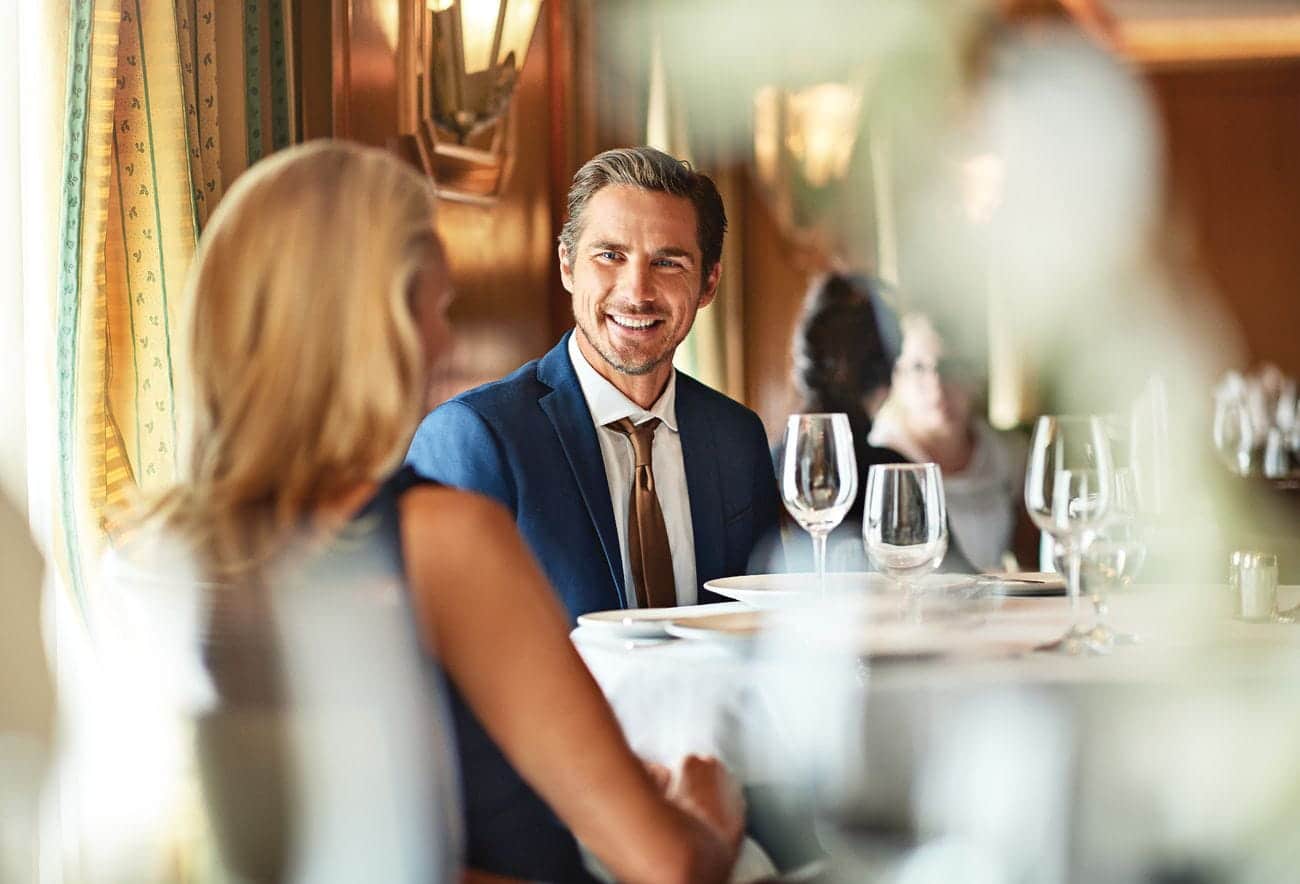 Couple enjoying a formal dinner on Grand Princess