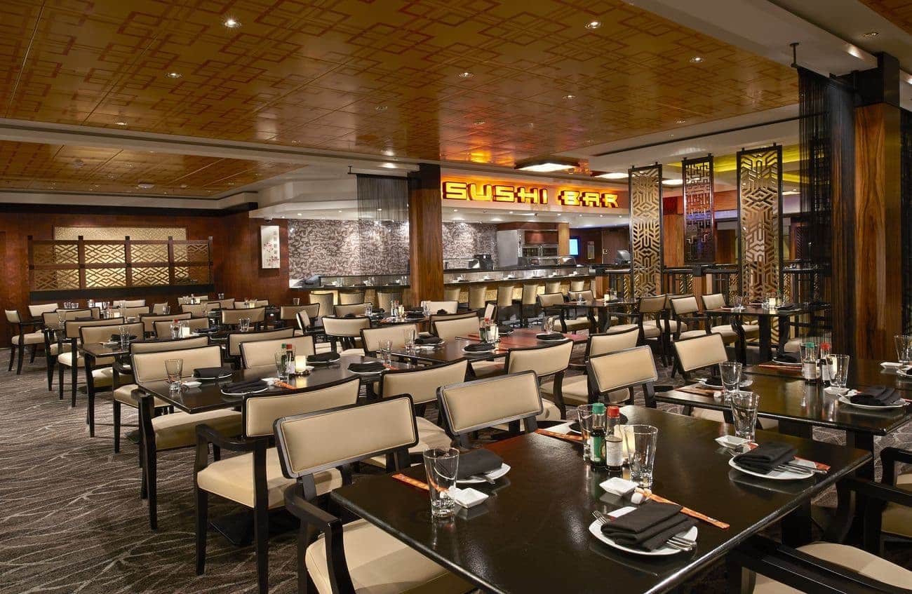Orchid Garden Asian restaurant with neatly set tables and sushi bar
