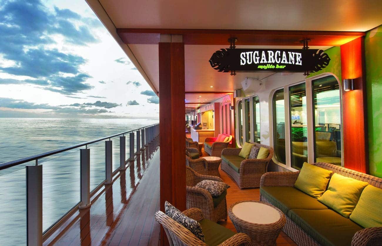Sugarcane Mojito Bar with ocean views and wicker seating