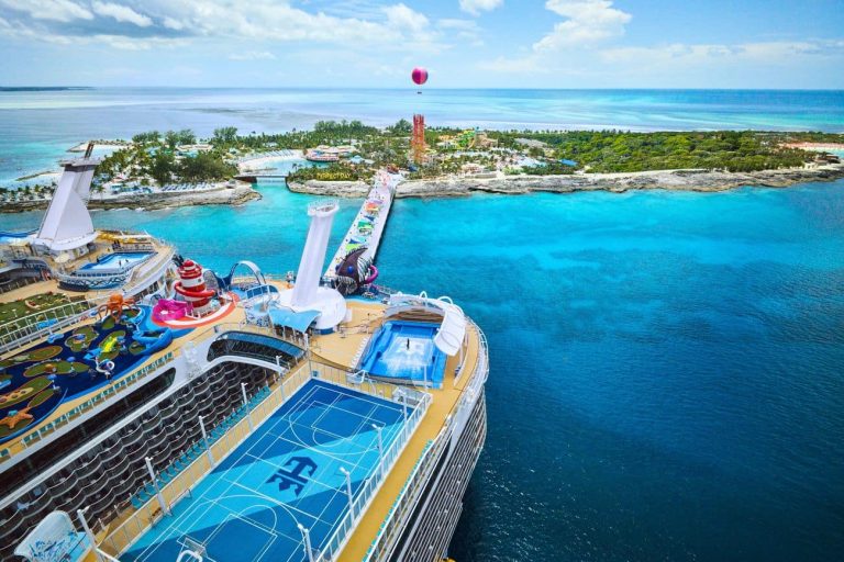 2027-28 Caribbean Deployment Highlights Royal Caribbean’s Expanding Market Presence Aerial view of Utopia of the Seas and Allure of the Seas docked at Perfect Day at CocoCay with the island’s attractions stretching beyond the pier