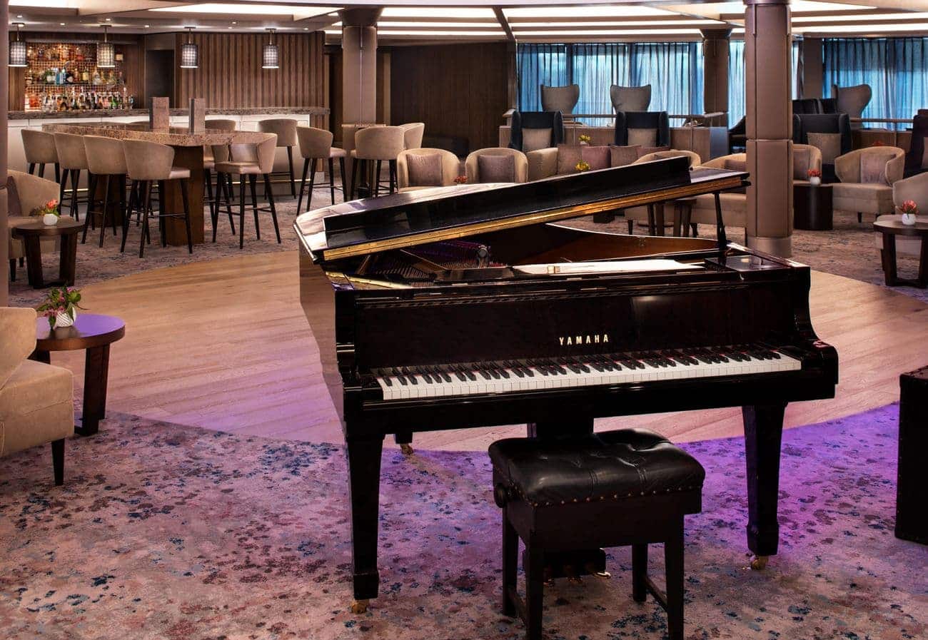 Rendezvous Lounge with piano and seating area
