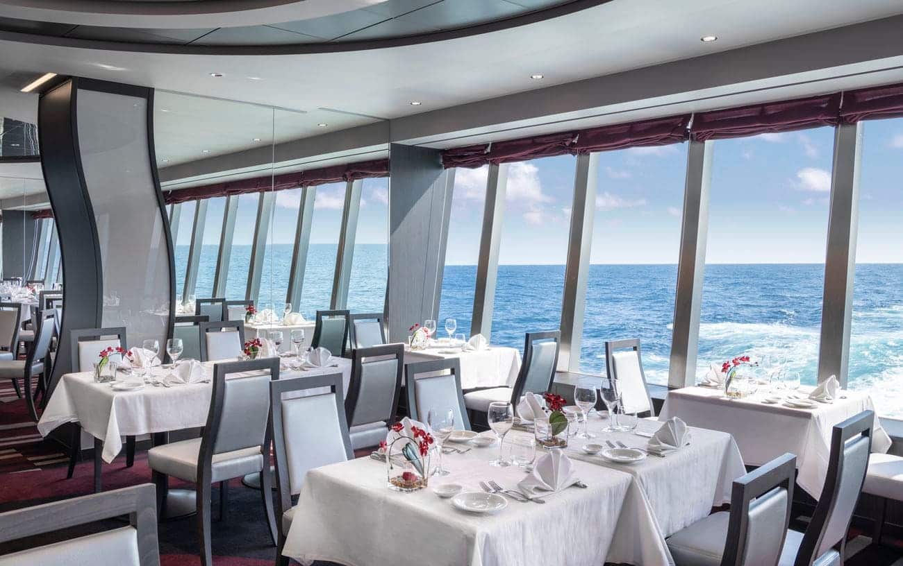 Panoramic dining room with sea-facing windows