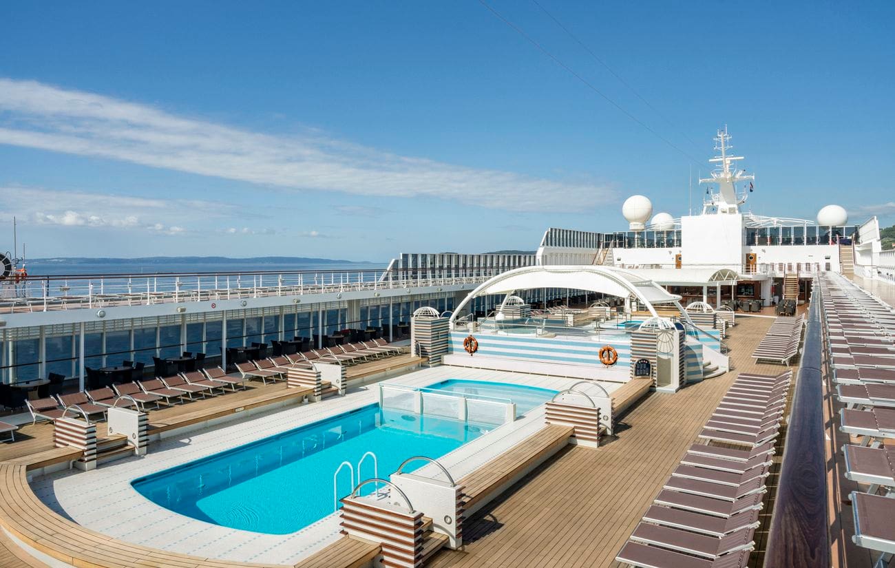 Open-air pool deck with loungers