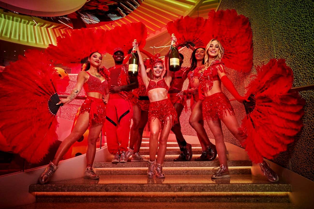 Scarlet Lady Roundabout performers in red