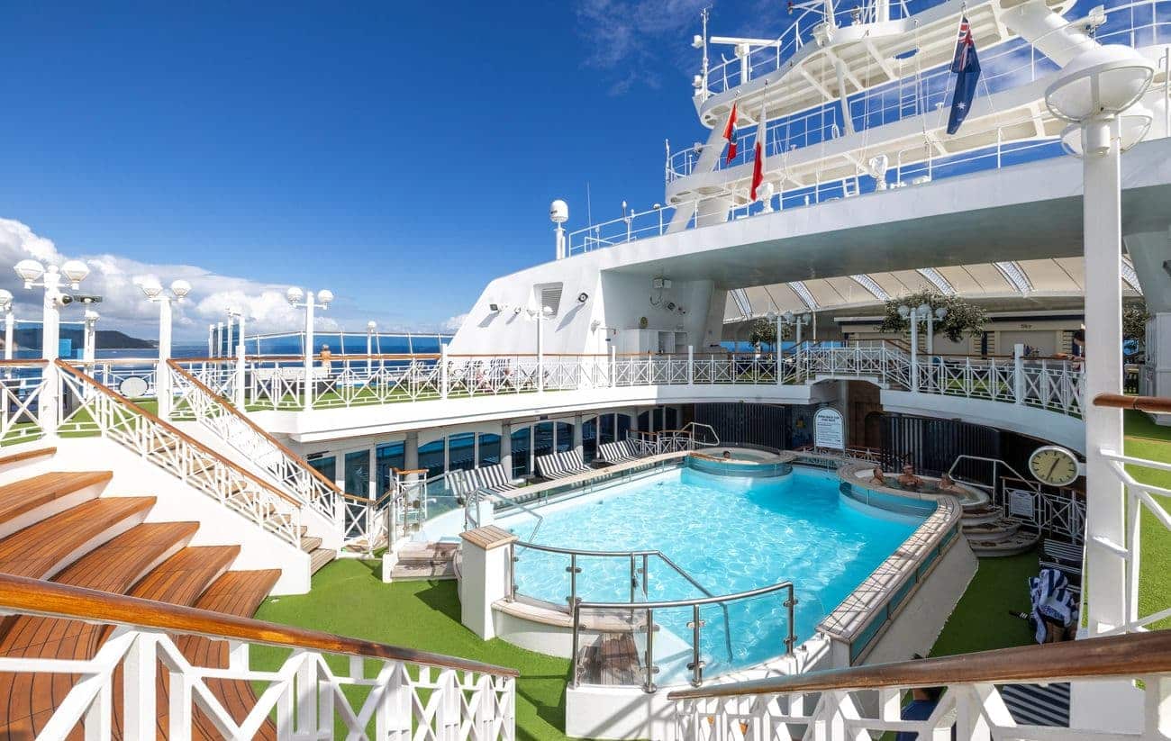 Carnival Adventure Byron Beach Pool with whirlpools and tiered open decks