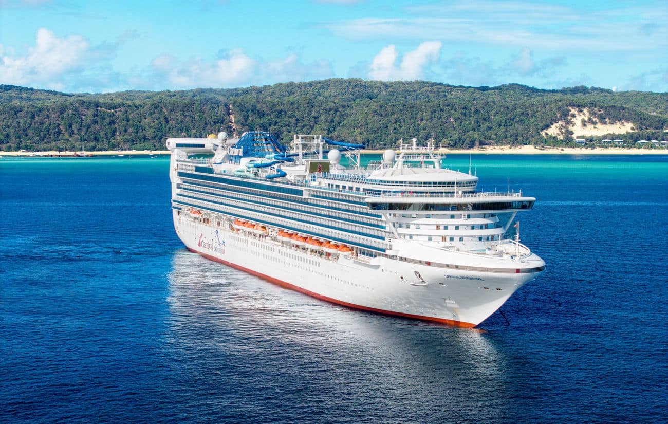 Carnival Adventure sailing near Moreton Island in clear blue Queensland waters