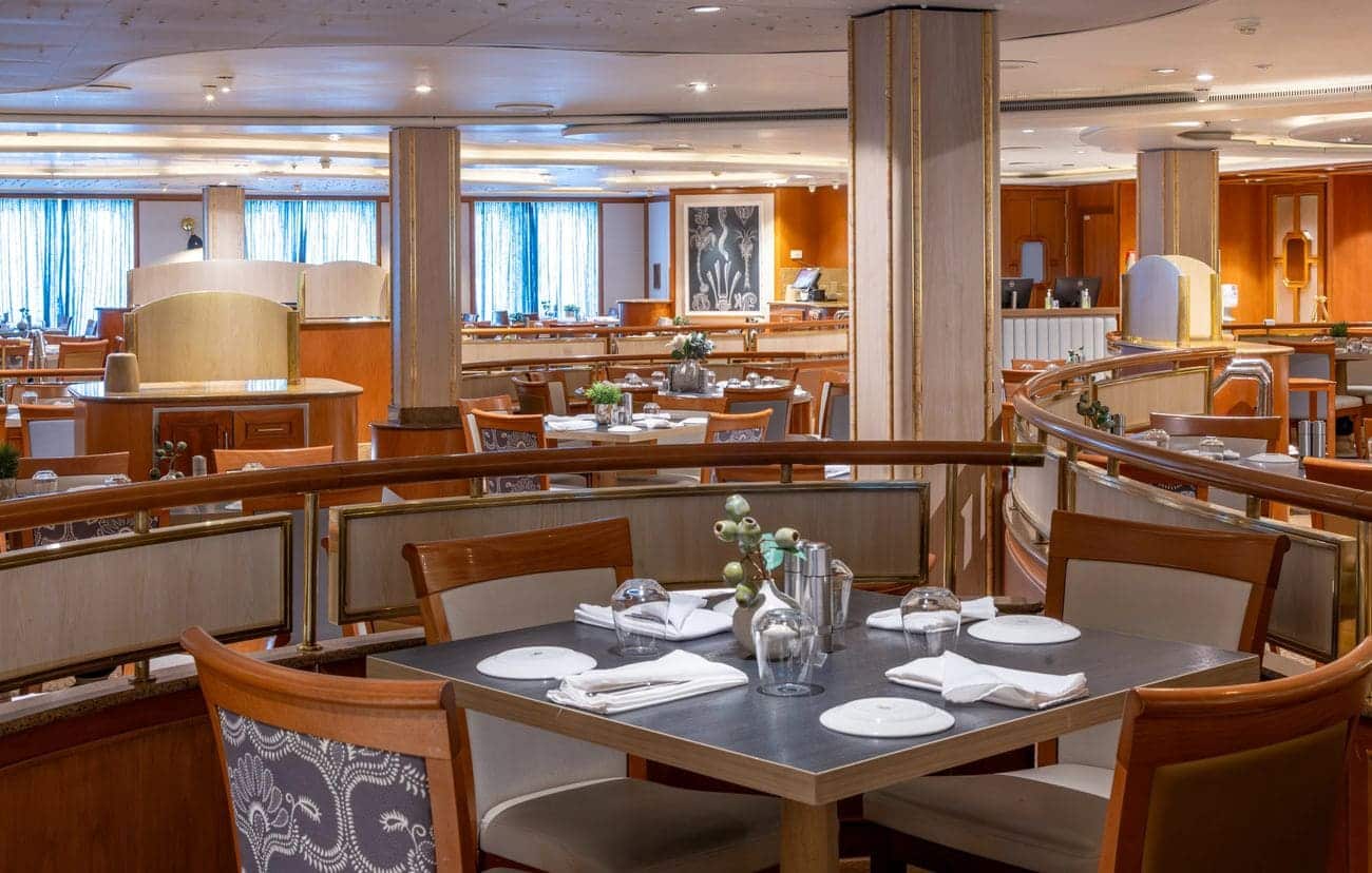 Waterfront Restaurant dining room with warm wood finishes and open seating