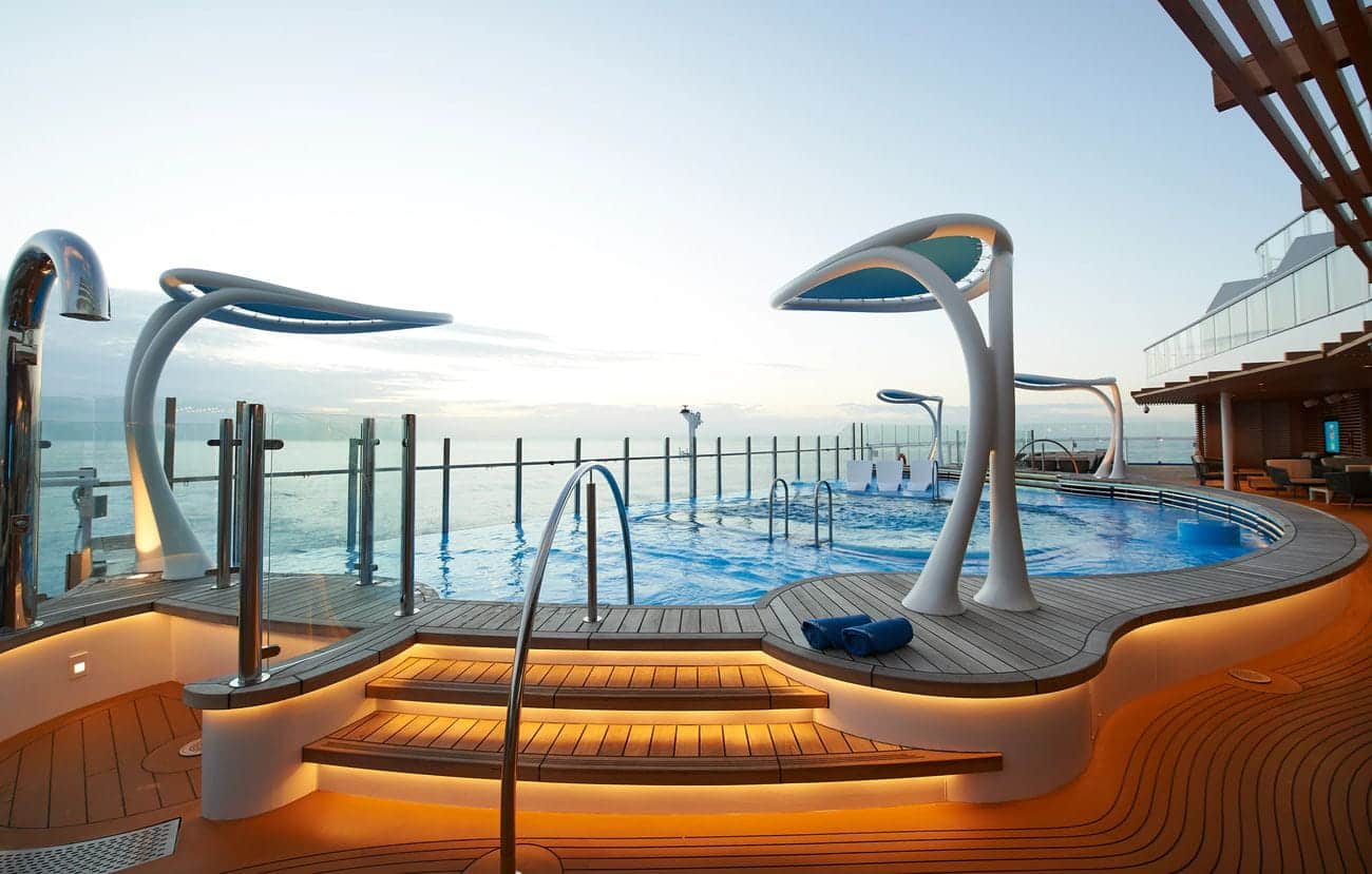 Infinity-style aft pool deck aboard Carnival Celebration overlooking the sea