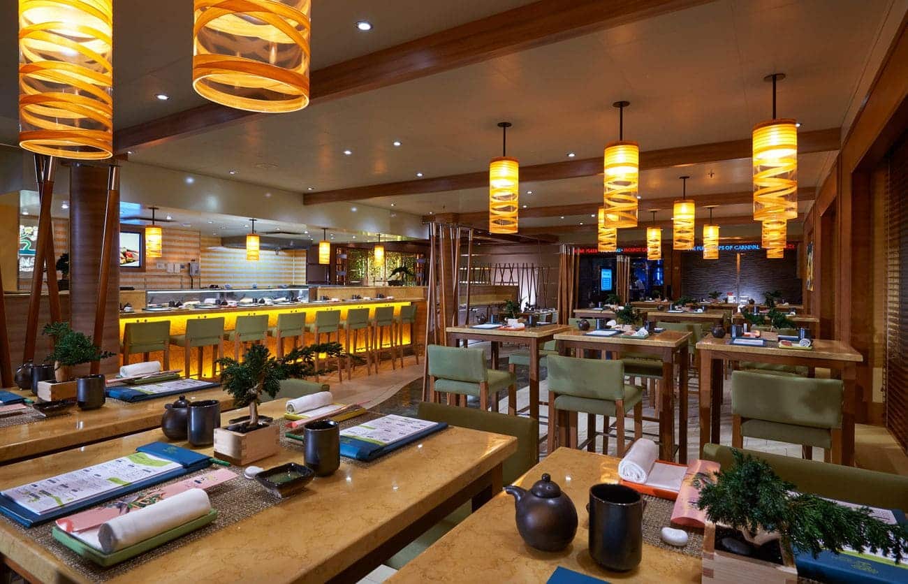 Bonsai Sushi specialty dining restaurant with warm lighting and wooden tables