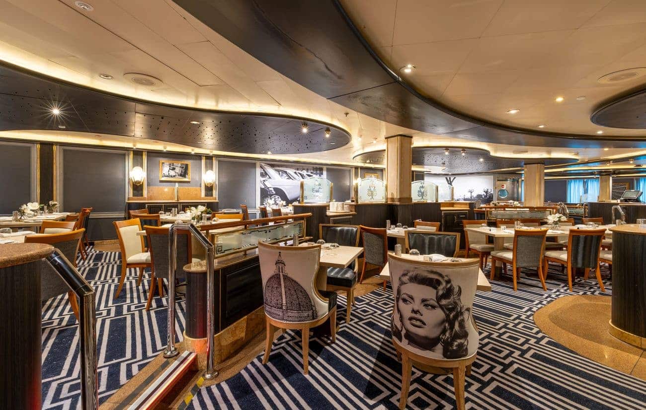 Angelos dining room interior with elegant seating and patterned carpet