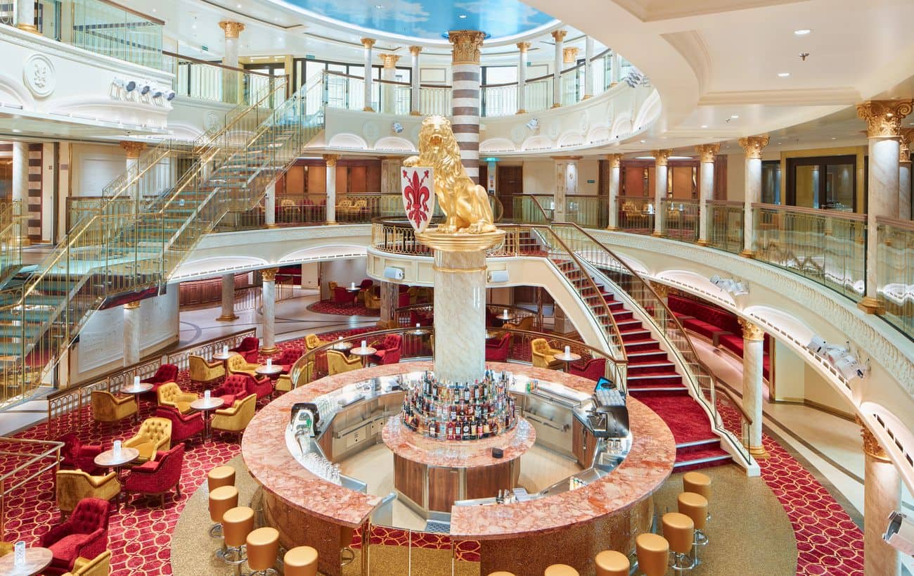 Grand Piazza della Signoria atrium aboard Carnival Firenze with ornate golden lion statue