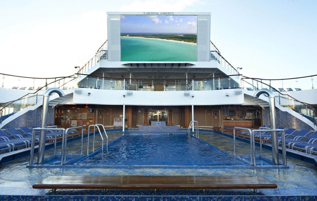 Carnival Liberty main pool with large outdoor screen