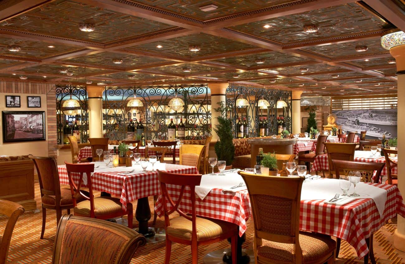 Carnival Magic Cucina del Capitano restaurant interior with red checkered tables and Italian themed decor