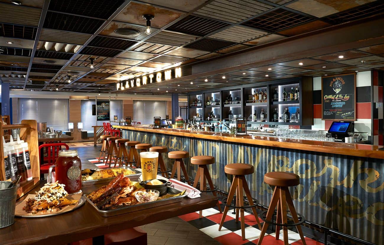 Pig & Anchor Smokehouse bar serving barbecue platters, beer, and cocktails on board