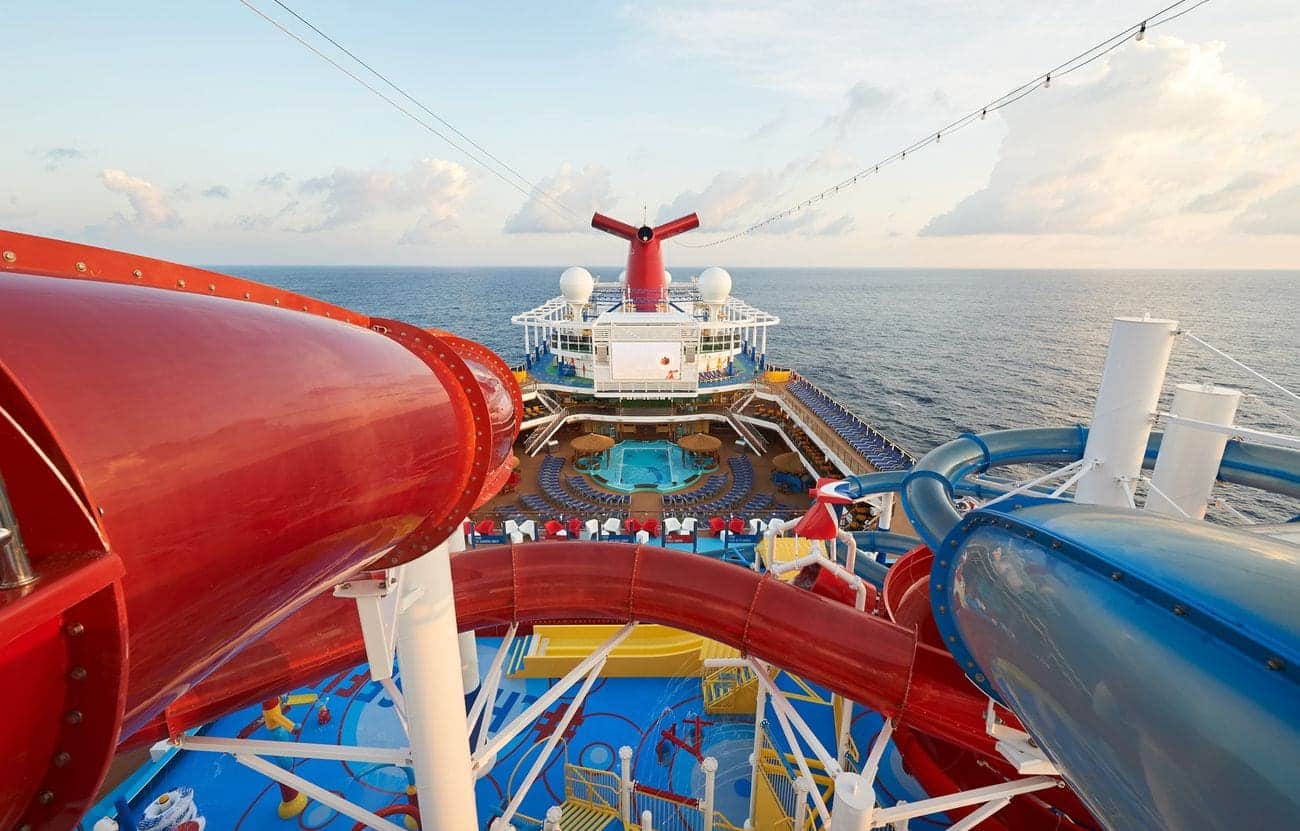 WaterWorks slides overlooking the pool deck on Carnival Panorama at sea