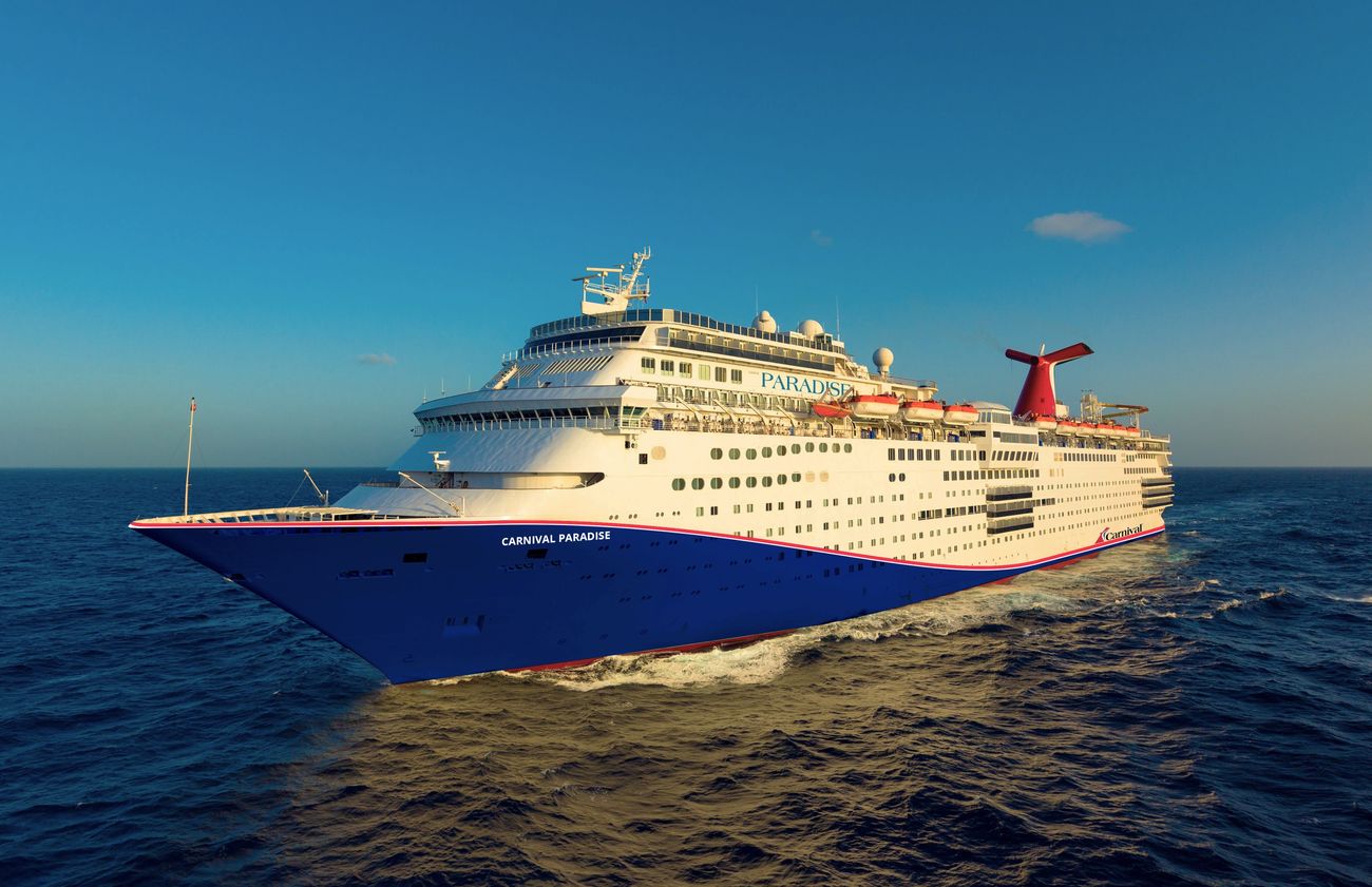 Carnival Paradise sailing at sea in an aerial starboard view