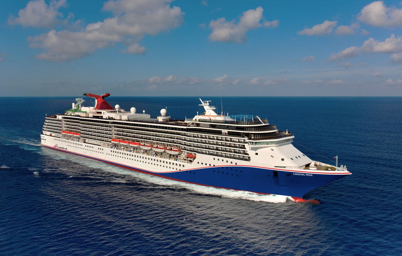 Carnival Pride sailing at sea in a starboard aerial view