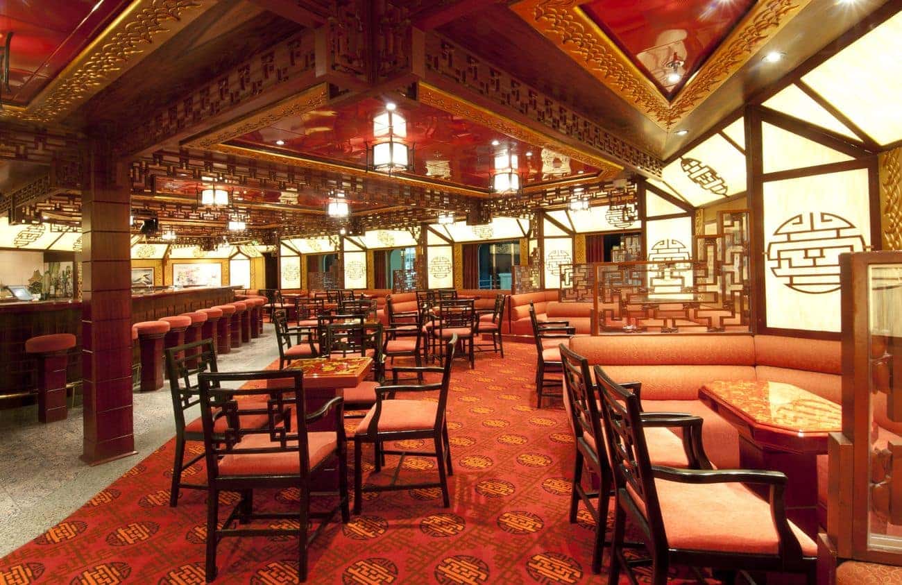 Asian-themed lounge with red and gold décor
