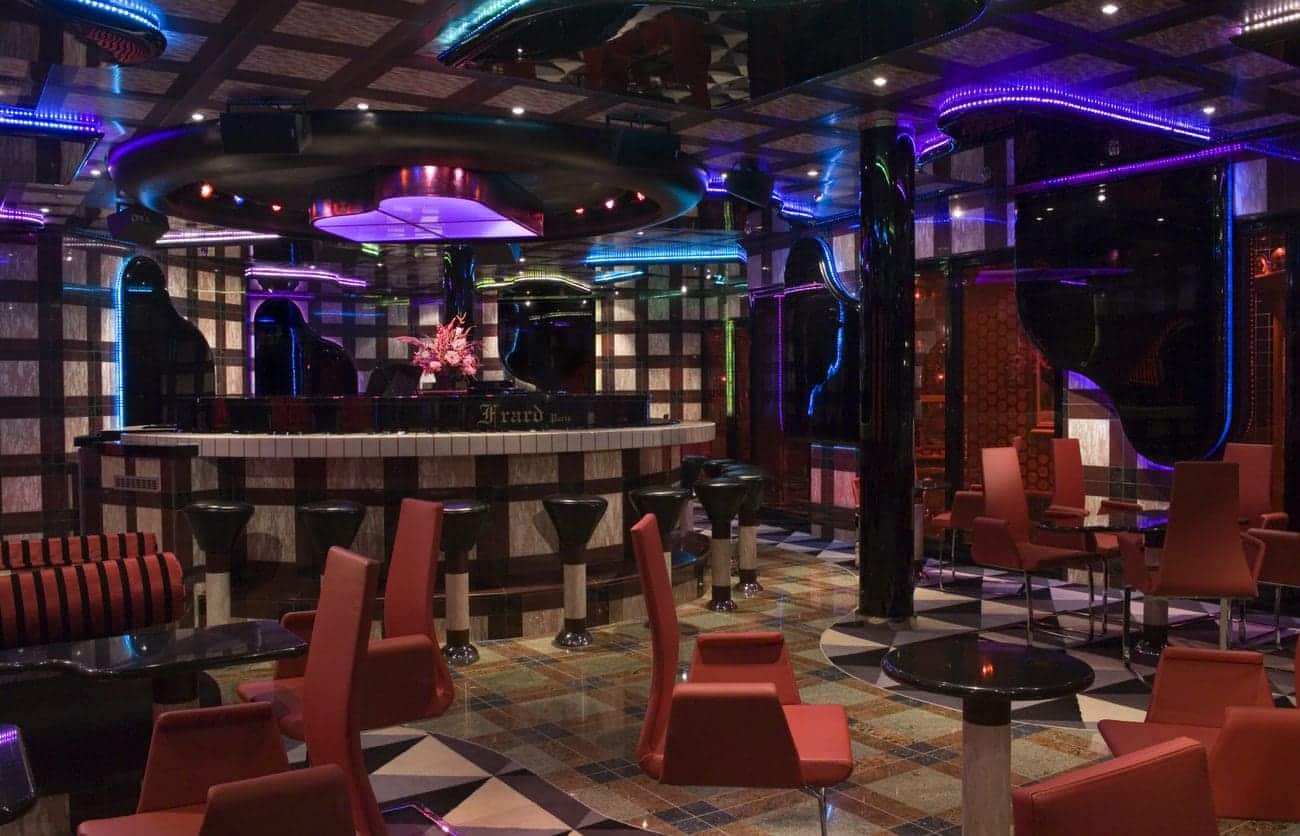 Carnival Splendor grand piano bar with colorful lighting