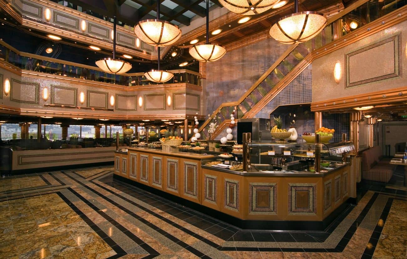 Buffet dining venue with serving stations and warm lighting