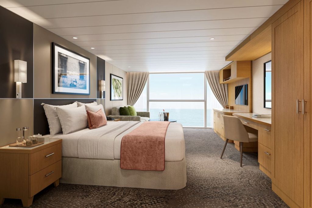 Spacious panoramic ocean view cruise ship suite with large window