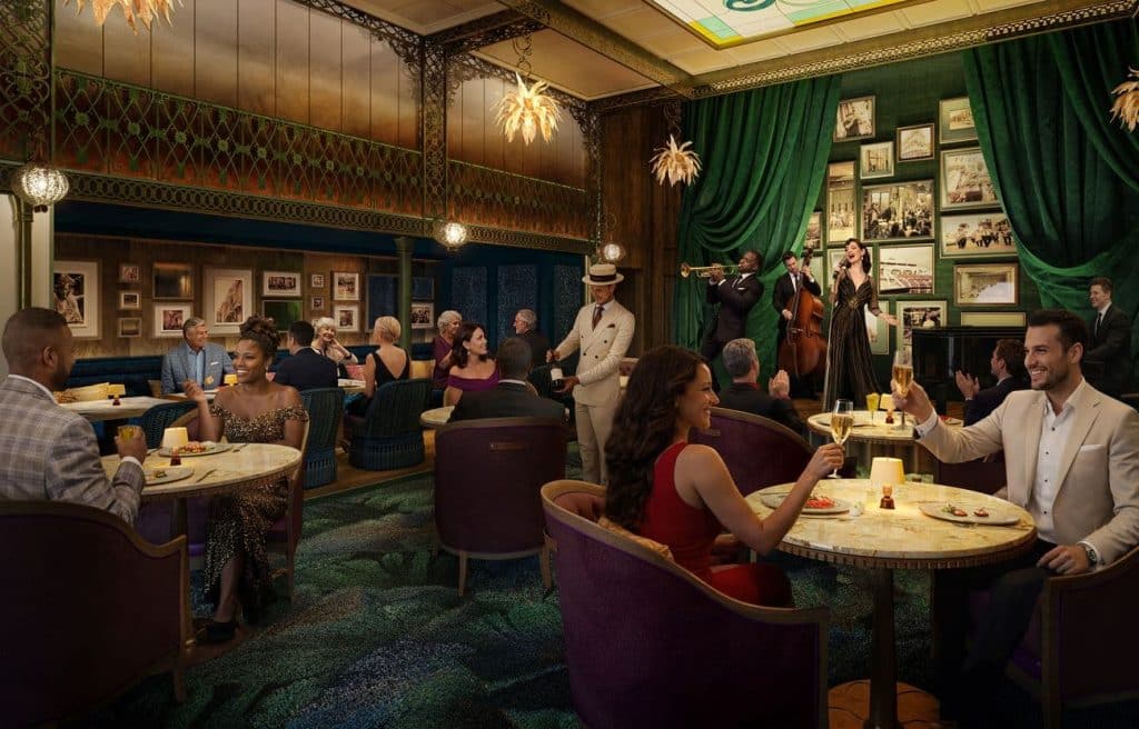 Guests enjoying dinner and live music inside Orleans Parish Supper Club