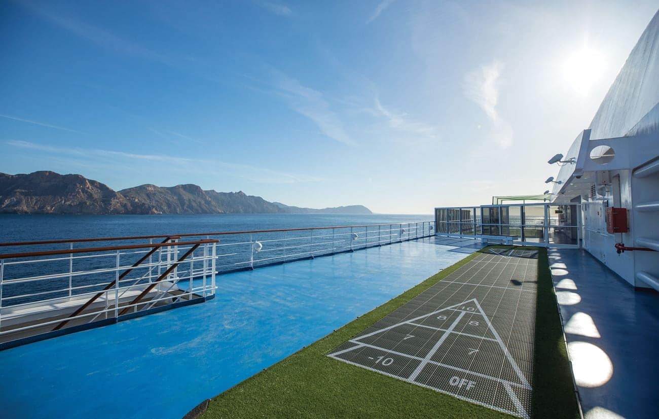Seven Seas Mariner outdoor sports deck shuffleboard court with ocean view