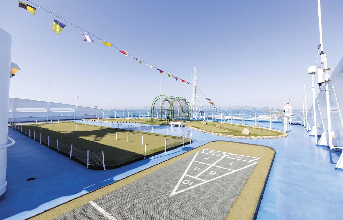 Sports deck with shuffleboard and mini golf