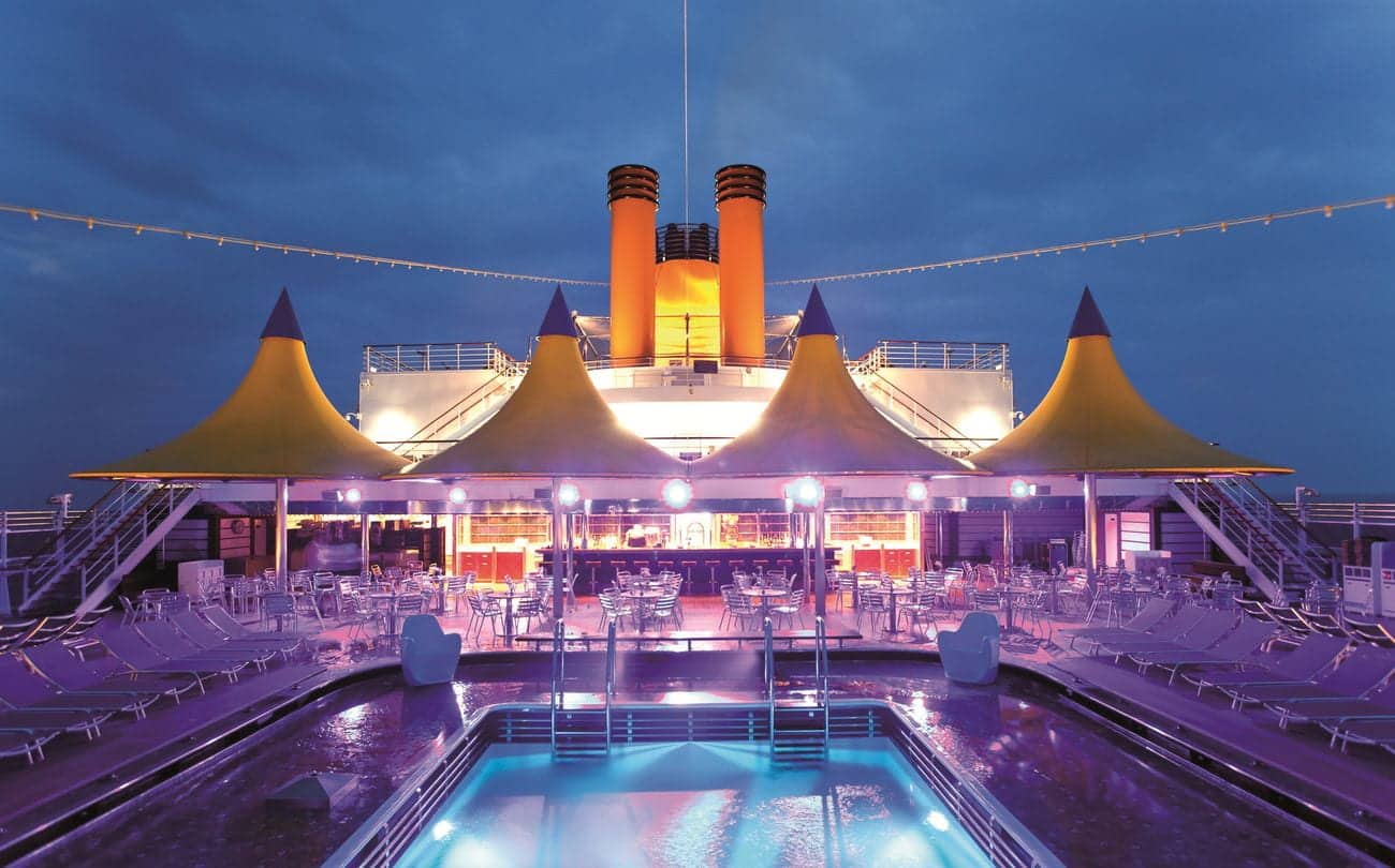 Acqua Regina lido deck pool glowing at dusk
