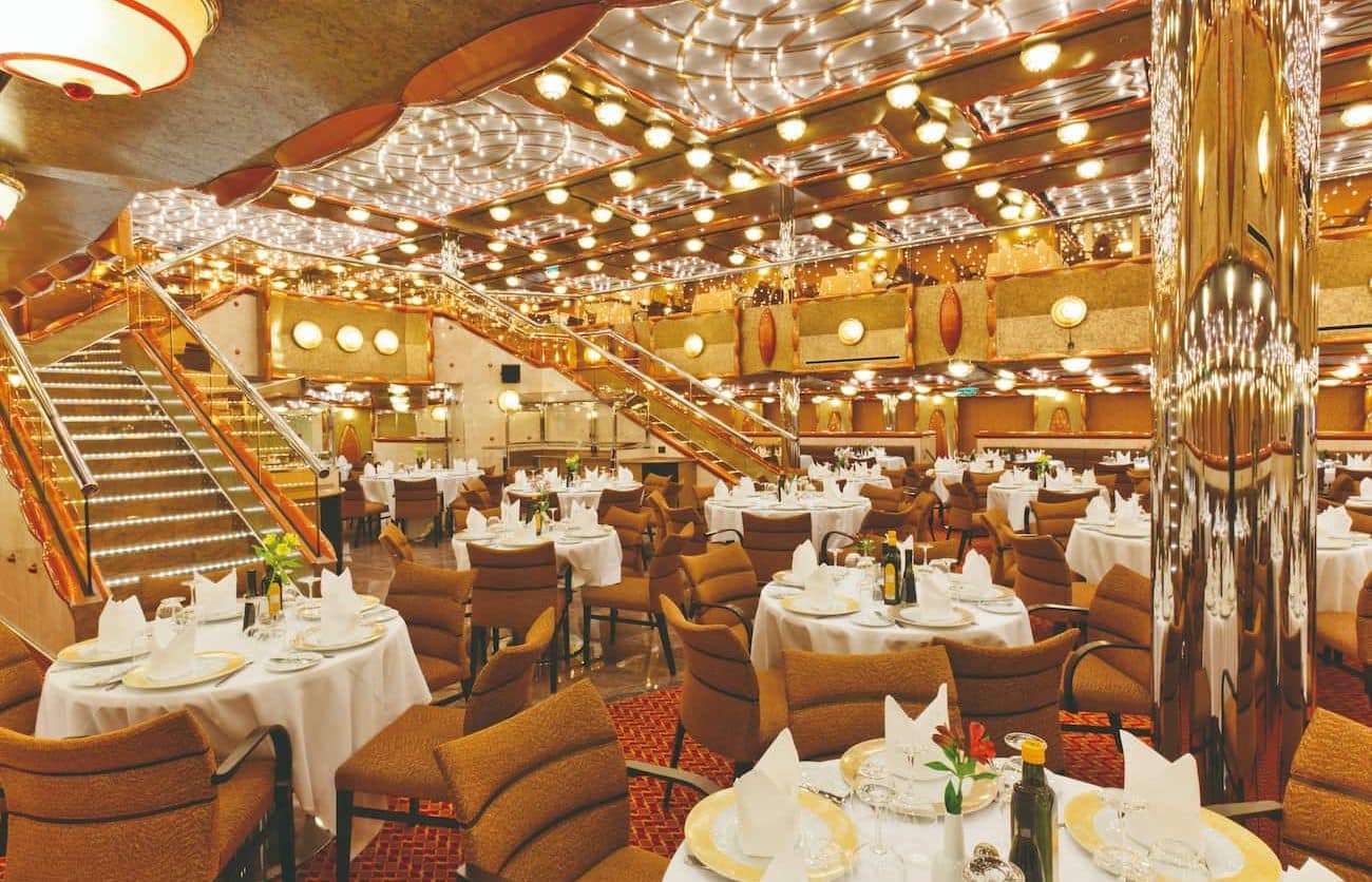Costa Favolosa main dining room with glowing ceiling lights