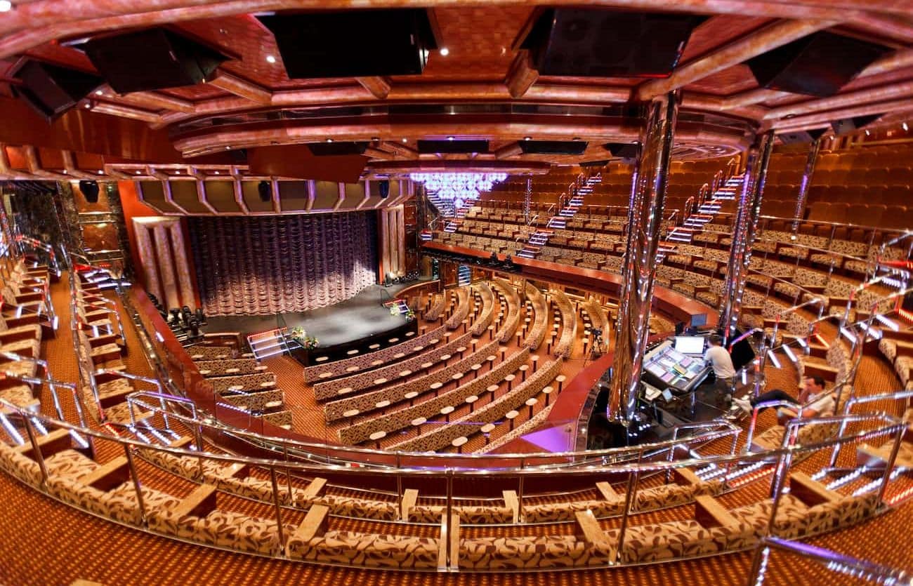 Costa Favolosa theater with tiered seating and large stage