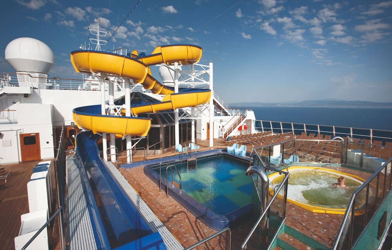Costa Pacifica Lido La Bamba with a yellow waterslide, pool, whirlpool, and open sea views