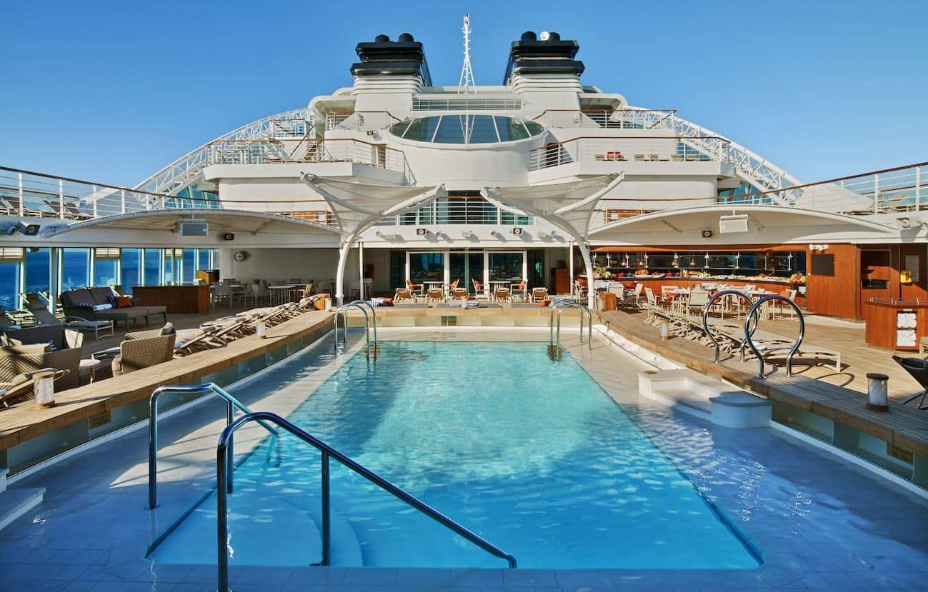 Seabourn Encore Pool Deck with central pool, loungers, and open-air seating.