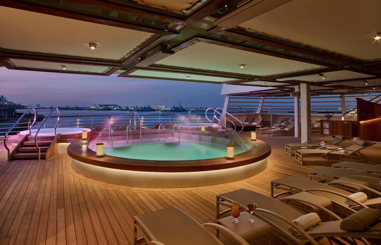 Seabourn Ovation aft pool deck with whirlpools and loungers