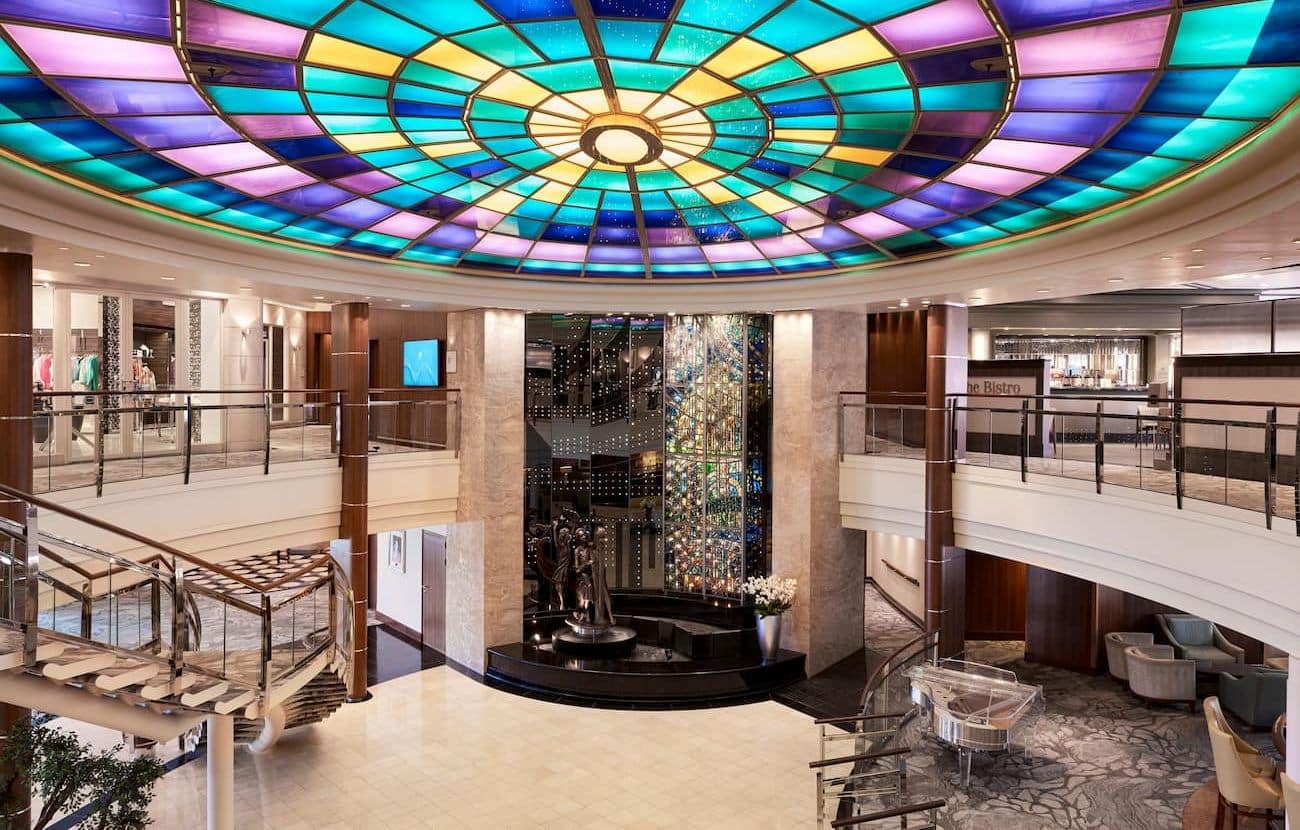 Crystal Serenity Atrium beneath colorful glass ceiling