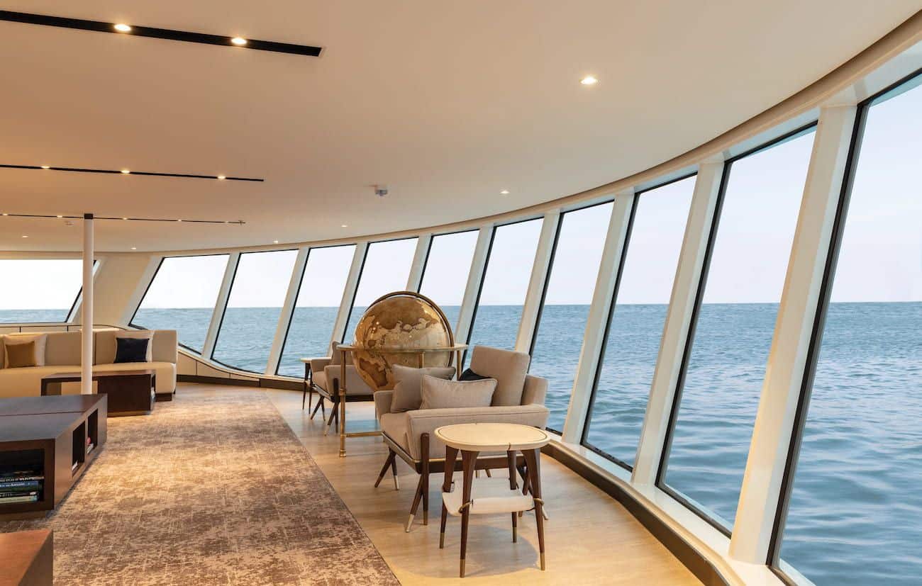 Observation Lounge seating beside panoramic windows