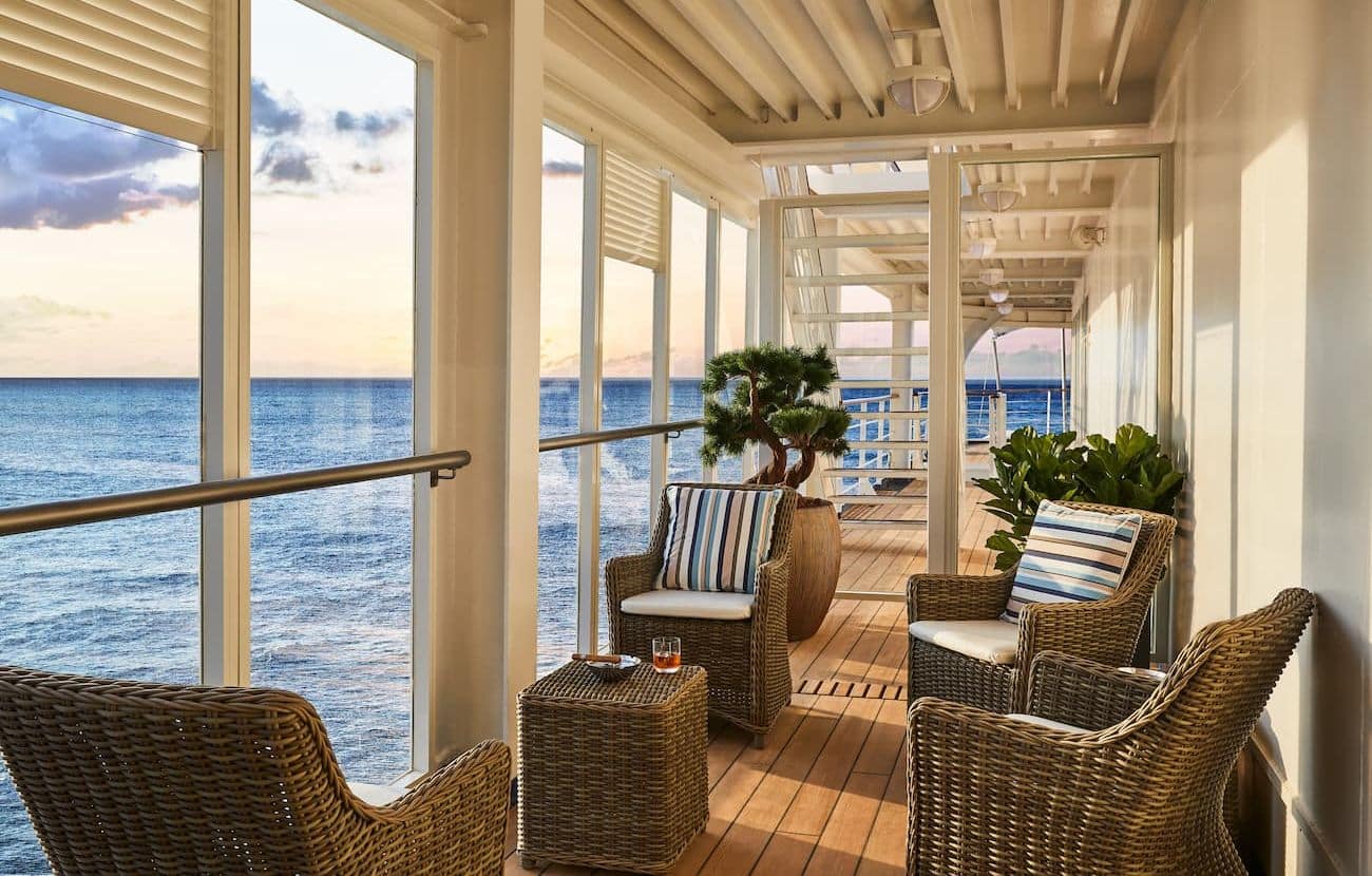 Connoisseur’s Corner veranda seating by ocean